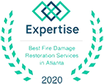 Award badge with the text: "Expertise. Best Property Damage Restoration Services in Houston 2020." Surrounded by a laurel wreath and geometric design, perfect for enhancing your footer and boosting SEO.